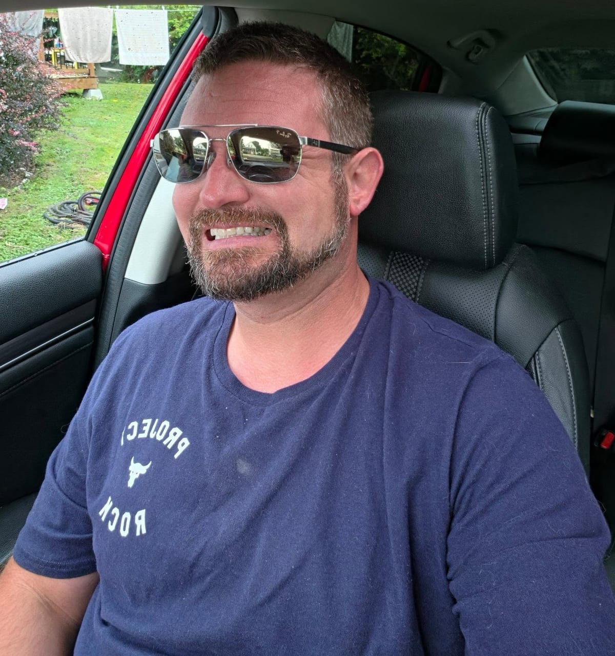 Brent Moulaison, owner of Brents Electrical & Security LTD., in the work truck between calls.
